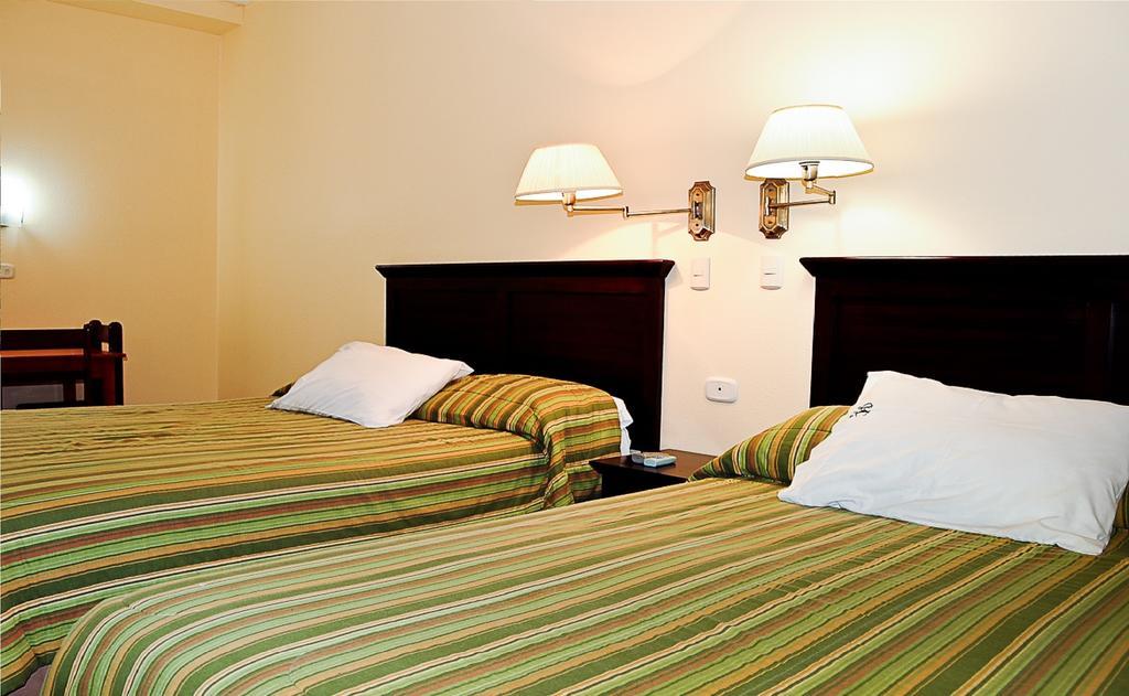 Hotel Presidente Selva La Merced  Quarto foto